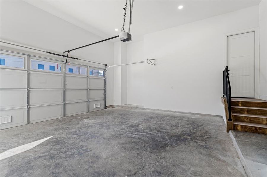 Designed with both practicality and potential in mind, this two-car garage offers the perfect canvas for all your storage and organizational needs. Whether it's tools, recreational equipment, or extra household storage, this space is ready to adapt to your lifestyle with ease.