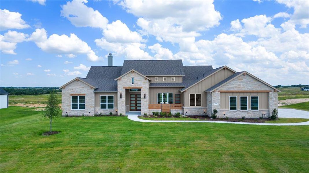 View of front of house featuring a front yard