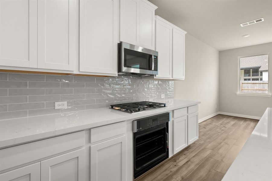 This kitchen is not only a functional space but also has ample storage. Whether you're a seasoned chef or just love to gather and enjoy good food, this kitchen is a dream come true.