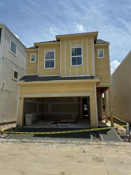 Three-story home with 3 bedrooms, 3.5 baths and 2 car garage