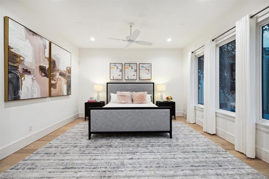 Large Primary Bedroom with a Minka-Aire Large Room Fan.