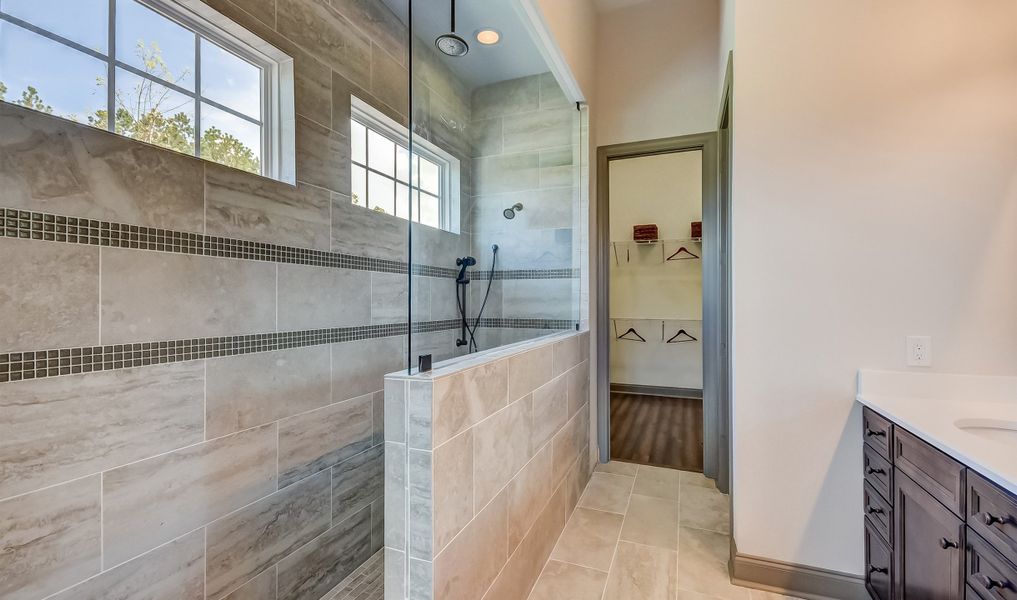 Owner's ultra spa bath with large shower