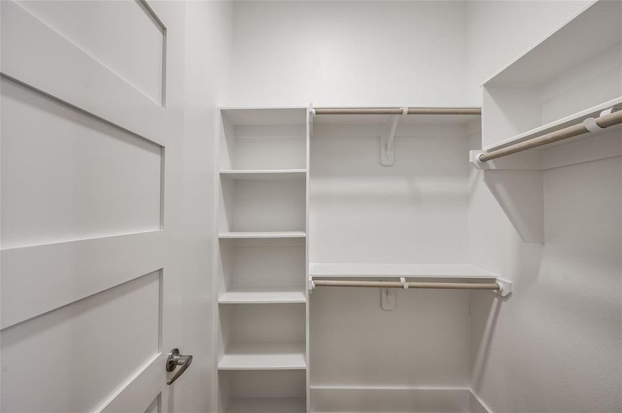 One of two walk-in closets in the Primary suite.