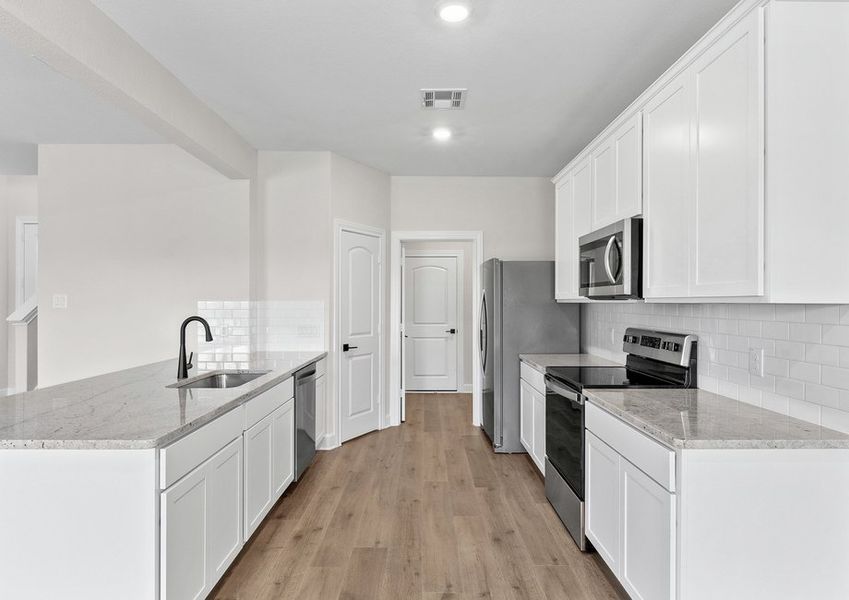 The kitchen of the Cypress has energy-efficient appliances.