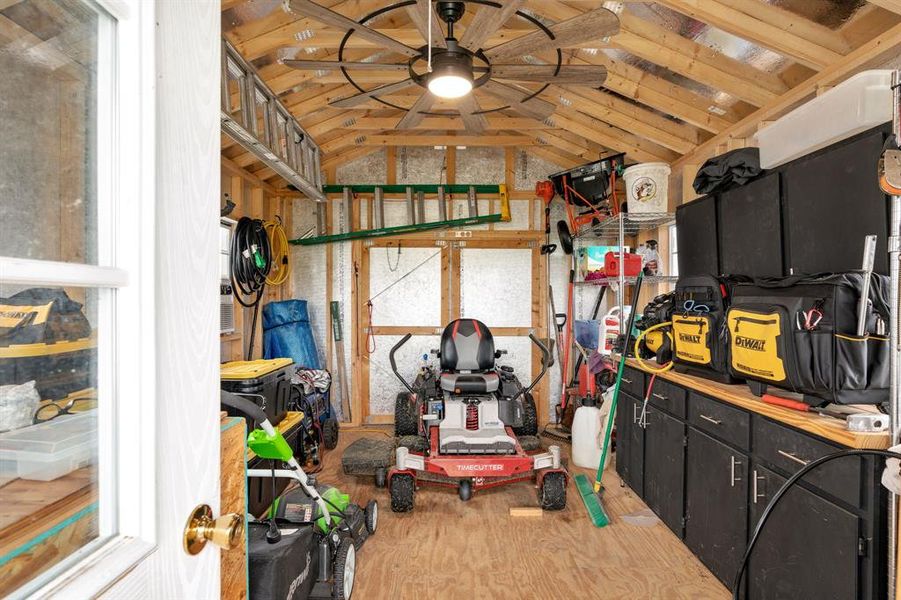 Interior of Shed with lots of storage space and cabinets/drawers.