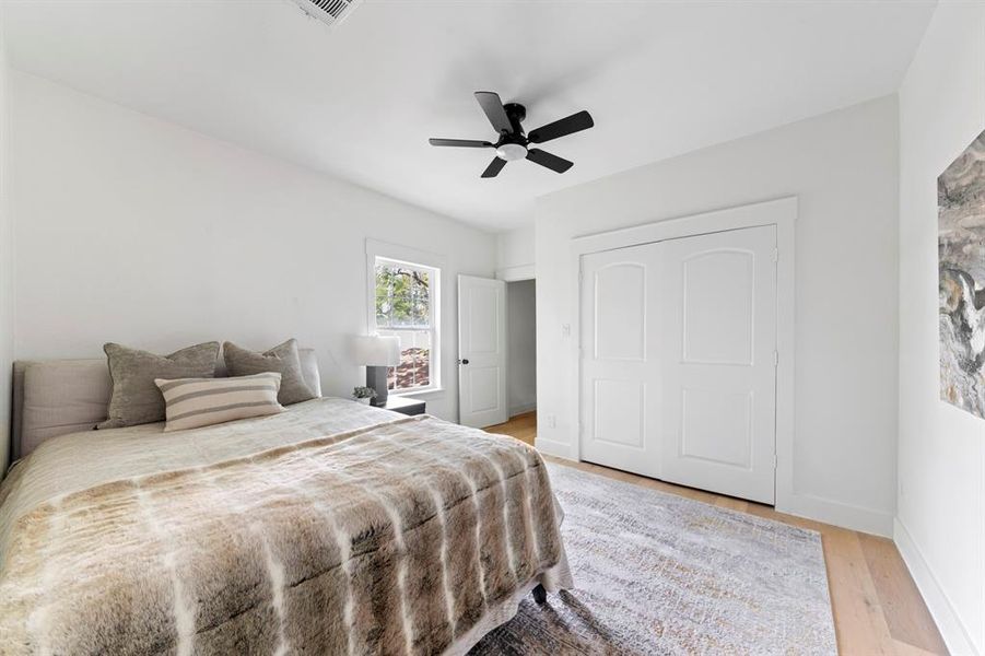 Oversized primary suite with large closet and separate closet for washer and dryer hook up. Your guests or tenants don't have to go anywhere to do their laundry!