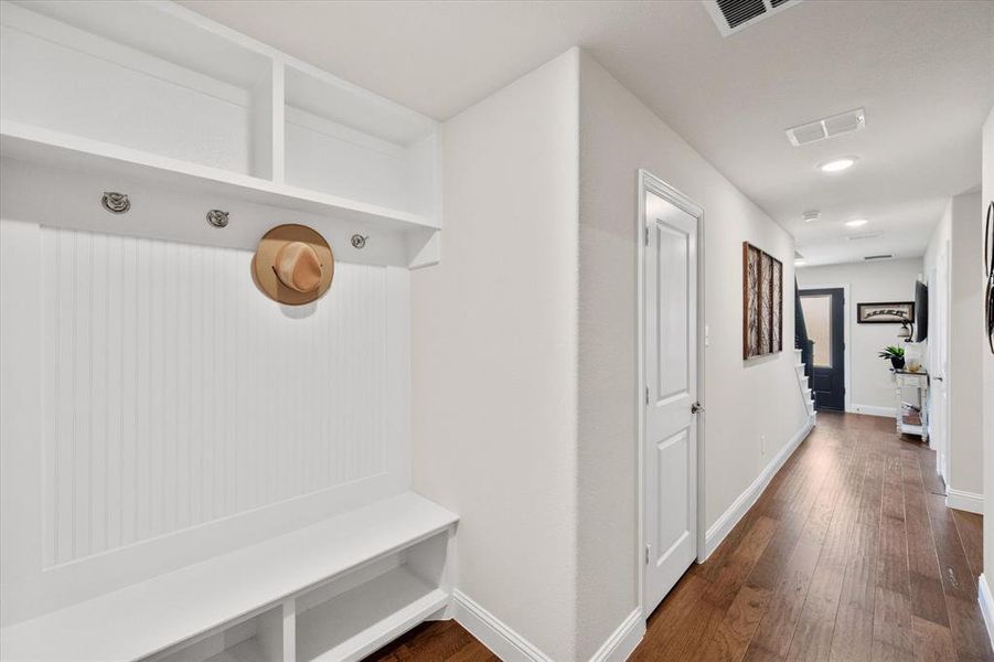 Mudroom featuring dark wood-type flooring