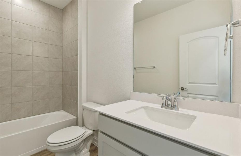 Upgraded secondary bathroom*real home pictured