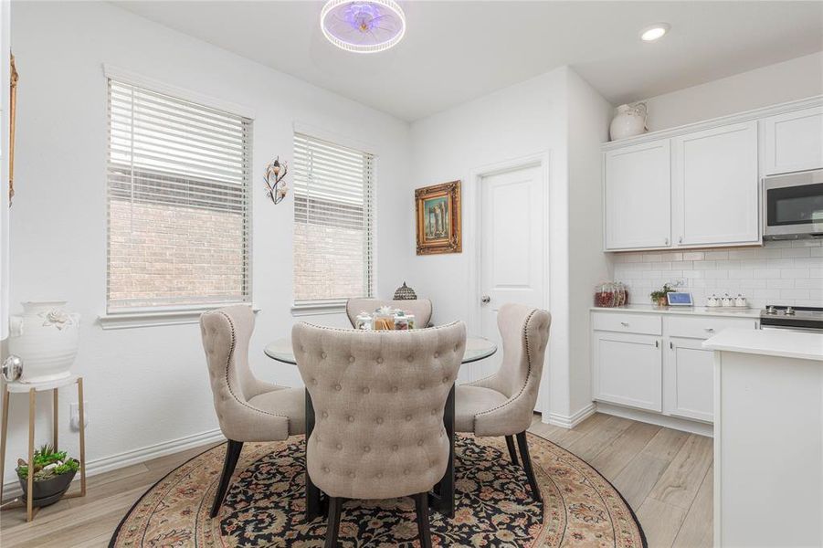 Dining area featuring light hardwood / wood-style floors