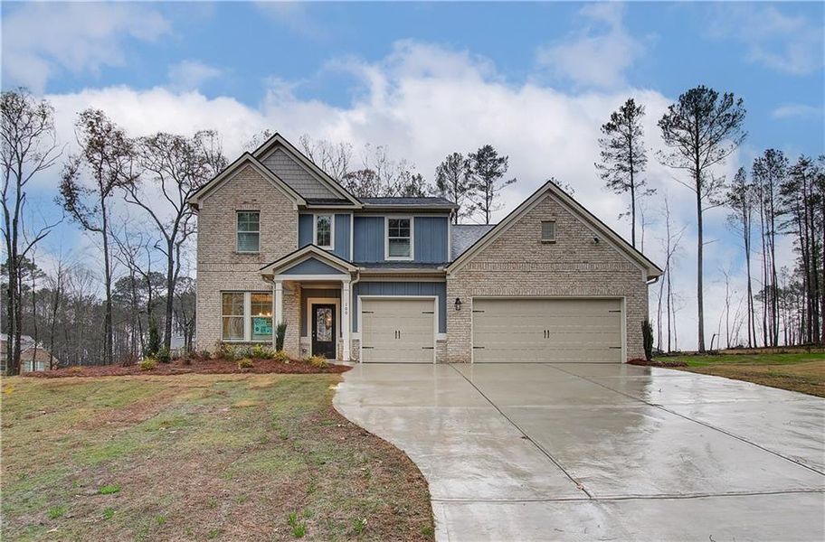 Craftsman-style house with a front yard