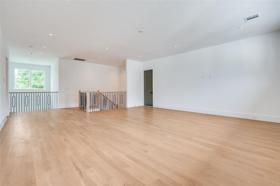 Empty room featuring light hardwood / wood-style floors