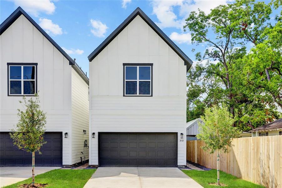 Each home has 2 car garage, long double wide driveway and sprinklers front and back.