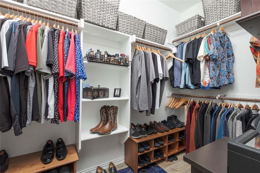 Walk in closet featuring hardwood / wood-style floors