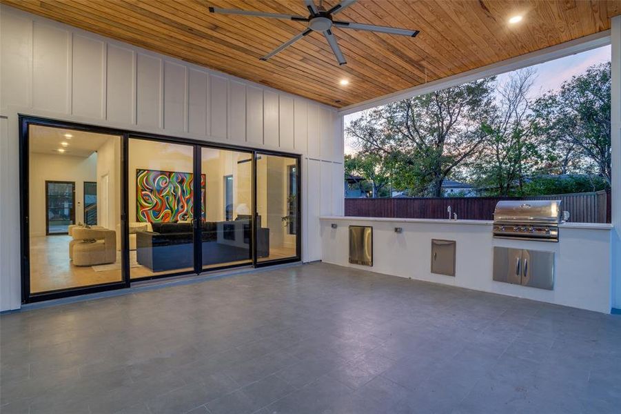 Covered Patio with Outdoor Kitchen with Sink, Grill and Bev Fridge