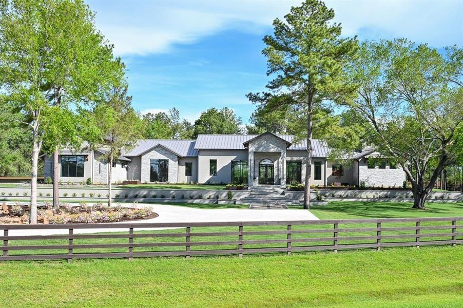 Welcome to your DREAM home at 61 Willowcreek Ranch Road in the prestigious Willowcreek Ranch Community!