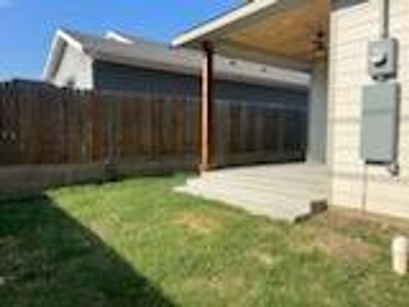 View of yard with a wooden deck