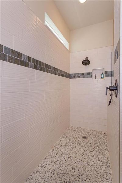 Huge walk-in shower with bench