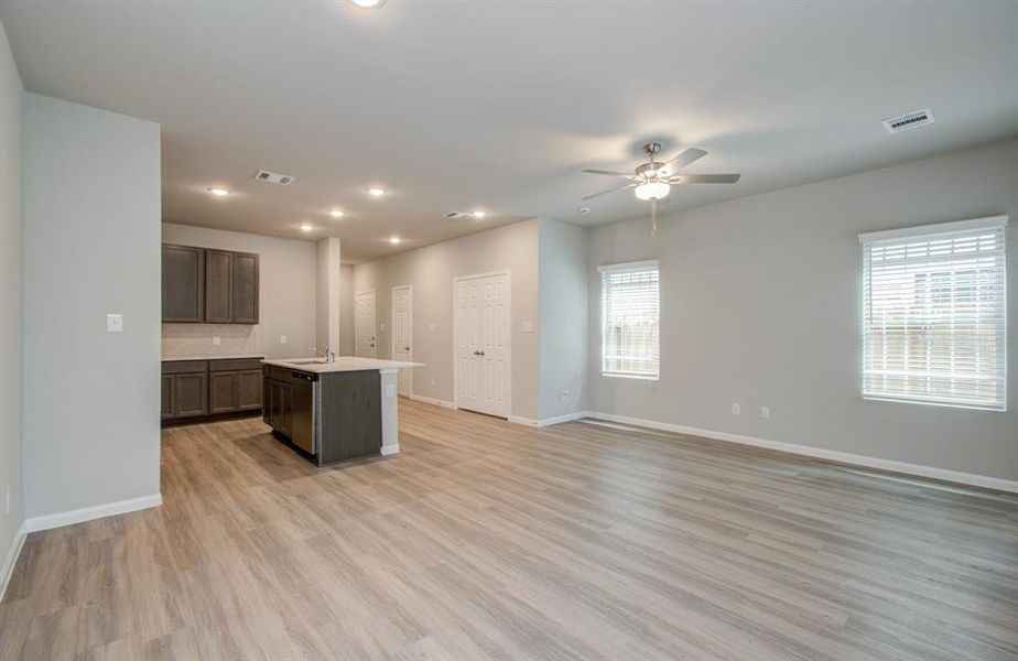 Open concept kitchen/dining/family room located on first floor