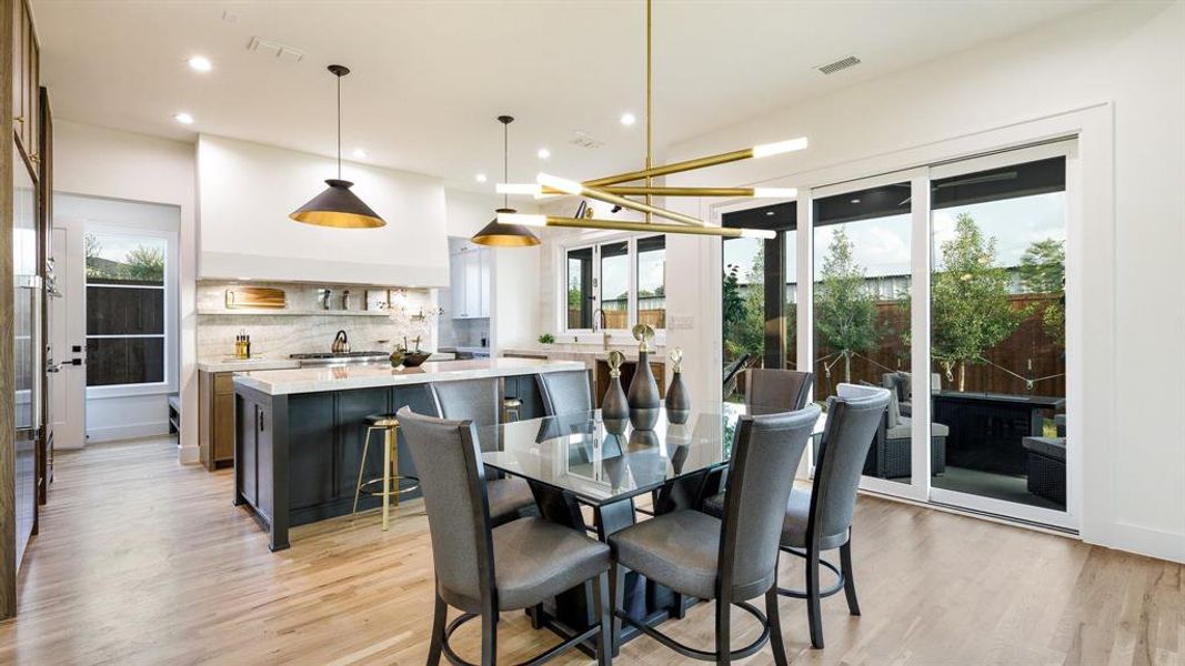 Dining space with light wood-type flooring