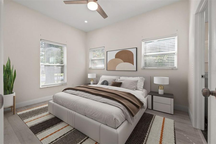 Virtually staged - Primary suite, full bath, spacious closet, remote ceiling fan / light combo