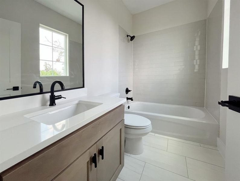 Sleek 3rd-floor bath with modern fixtures and natural light.