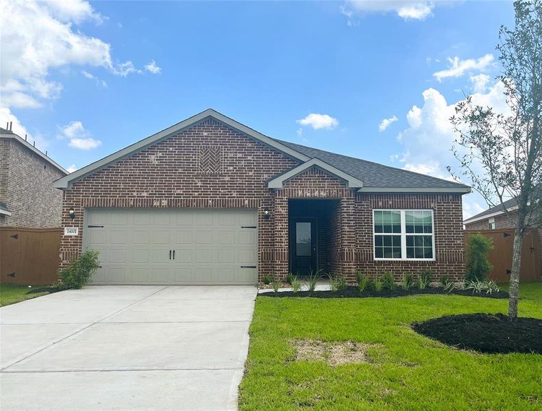 This charming home features 3 bedrooms, 2 bathrooms, and a 2 car garage.