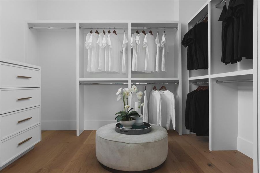 The large walk-in dressing room is already outfitted with custom storage so you can move right in.