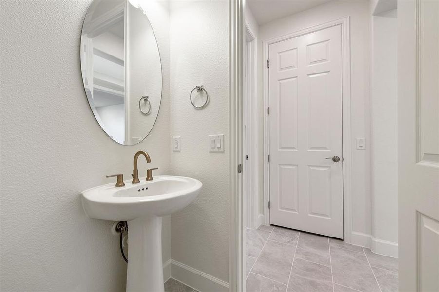 Bathroom featuring tile patterned flooring