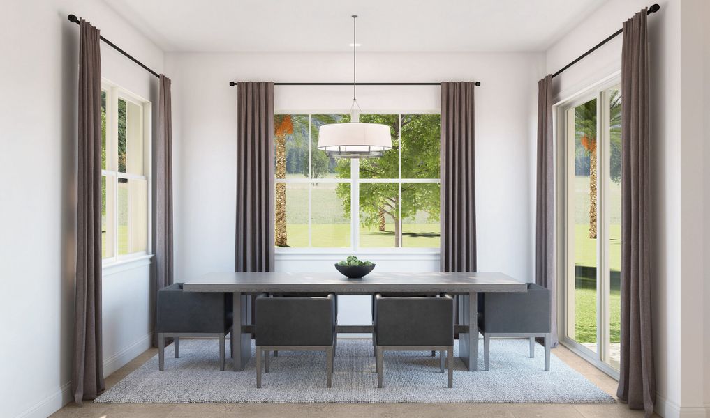 Elegant dining area & sliding door access to patio