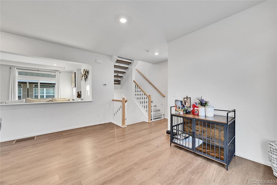 The dining area offers plenty of space and laminate flooring.