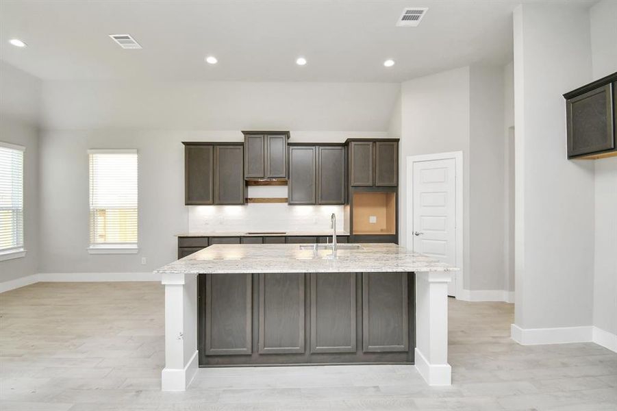 This generously spacious kitchen is a dream realized!