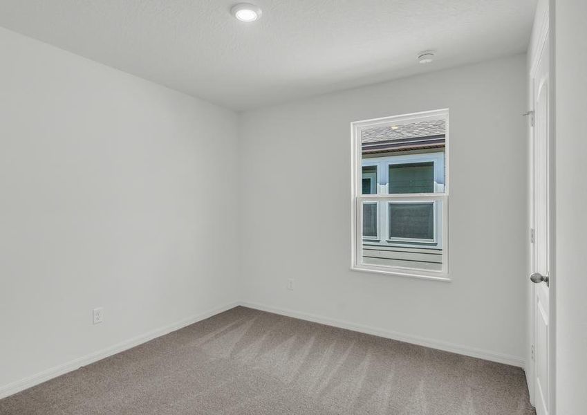 Each room comes with a window, tan carpet and closet