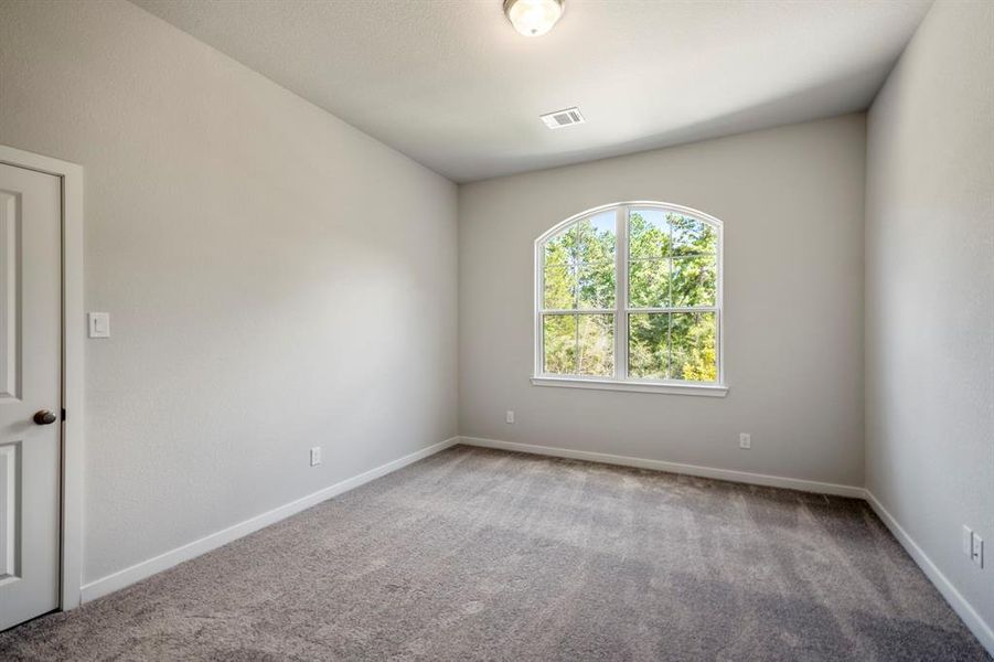 This secondary bedroom offers a great layout for furniture.