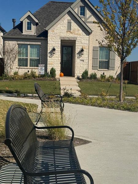 View of front of home featuring a front lawn