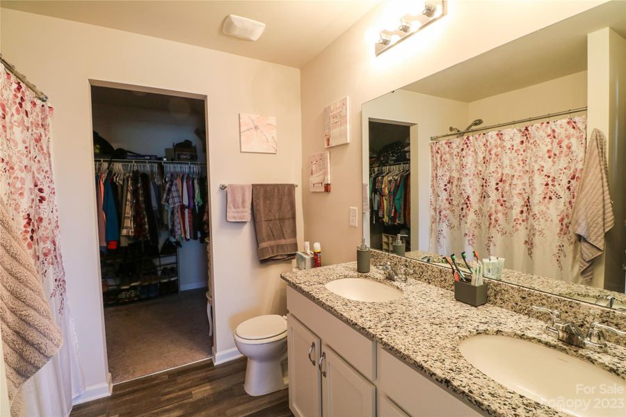 Primary bath with large walk-in closet
