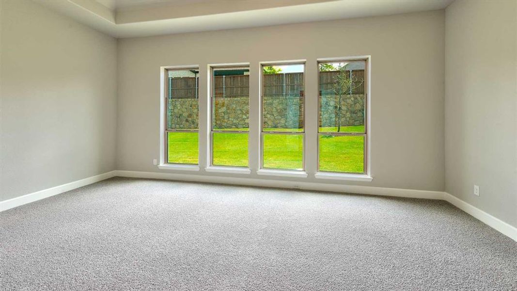 Empty room featuring carpet flooring