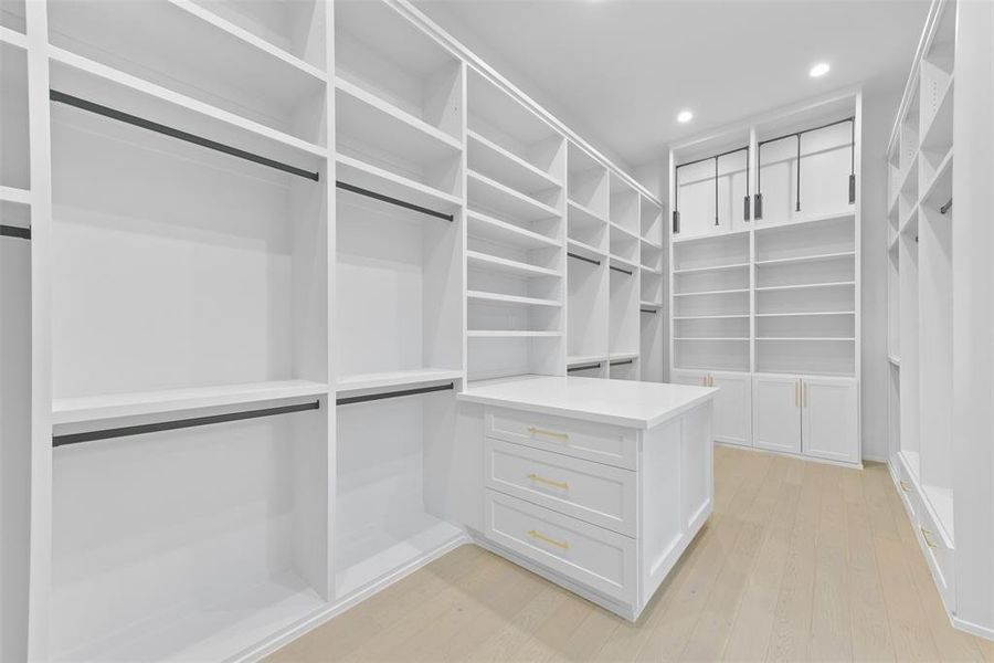 The primary closet is split with built-ins every direction offering ample space for both Primary suite residents. All built-ins can be customized to meet the buyer's specific needs.