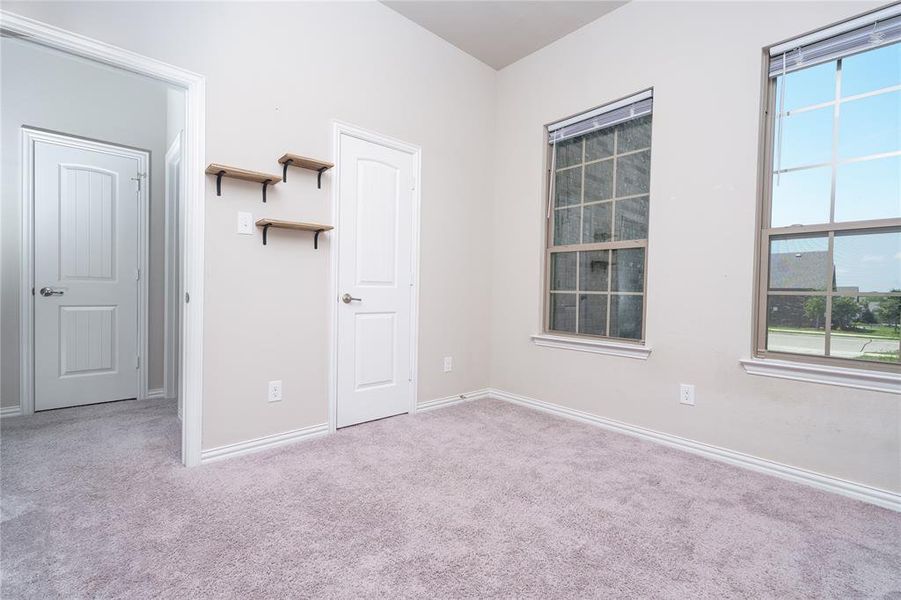 Empty room featuring carpet floors