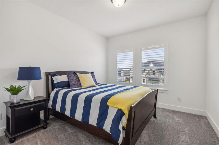 Guest Bedroom 2nd level featuring carpet flooring