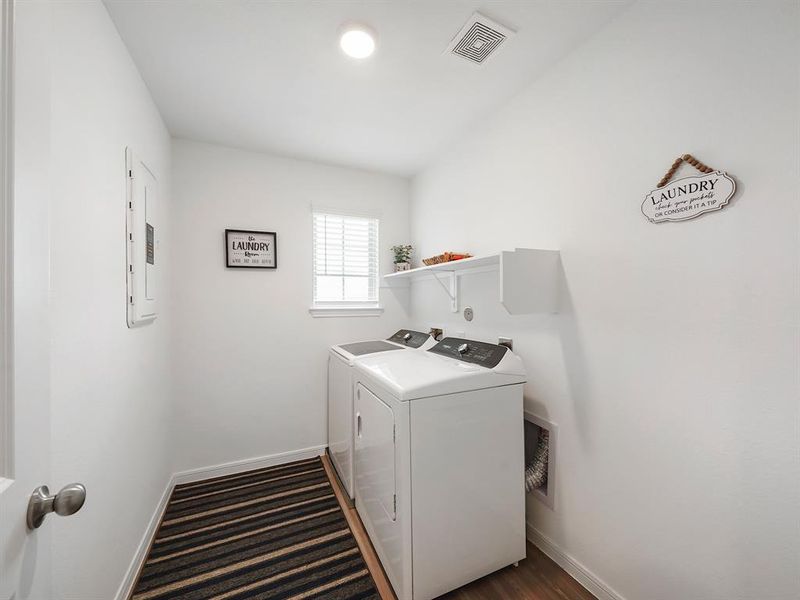 Laundry Room located upstairs.