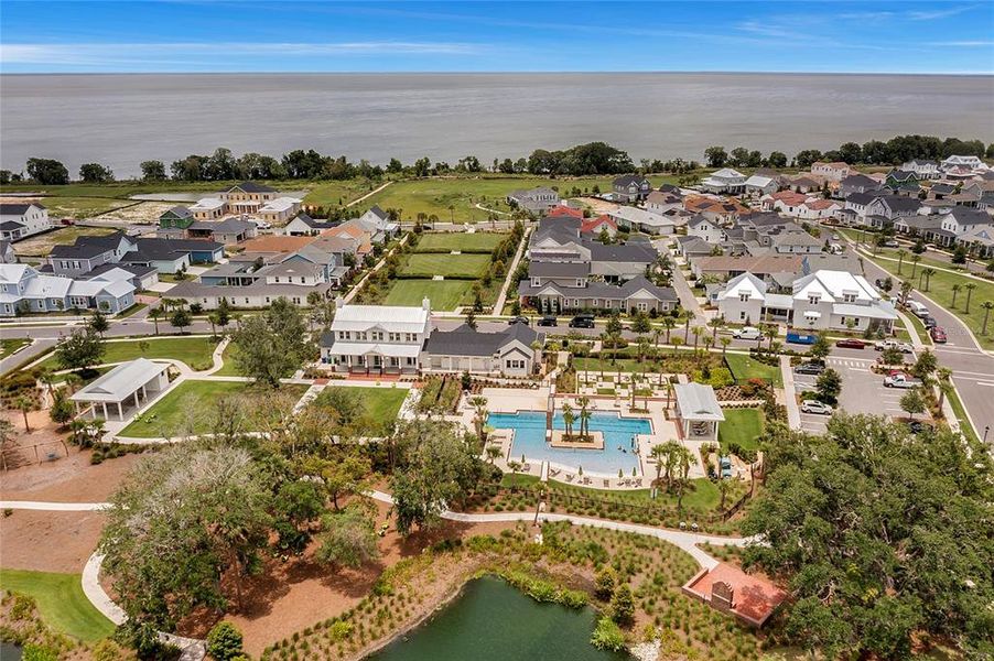 Community pool and club house with Lake Apopka in the distance