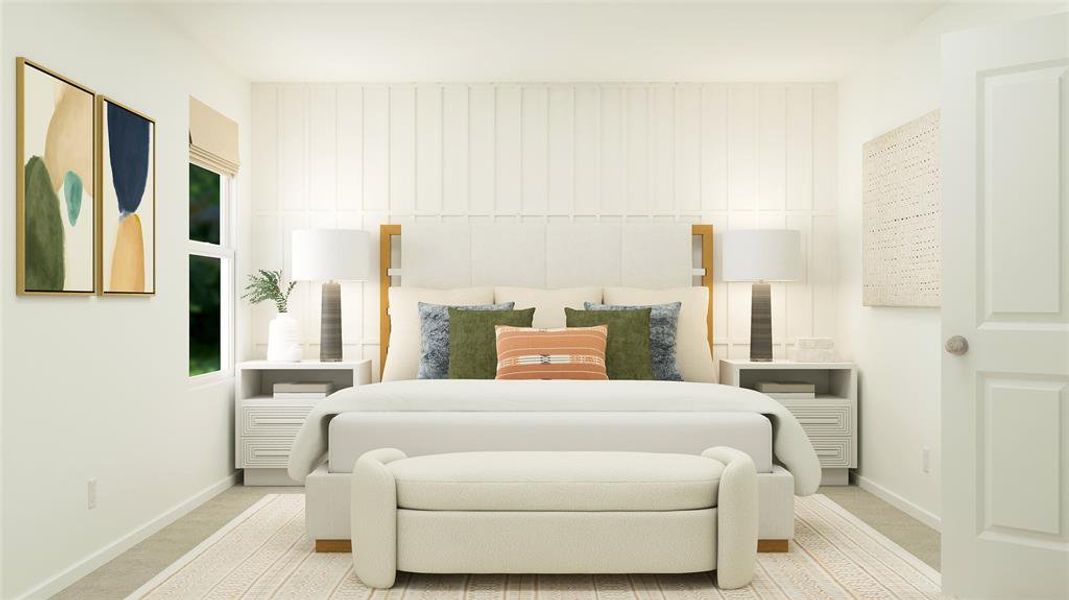 Bedroom featuring light colored carpet