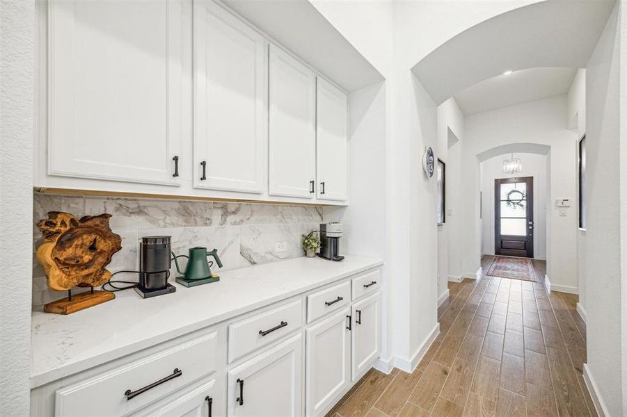 Quartz counters. Coffee/serving area.