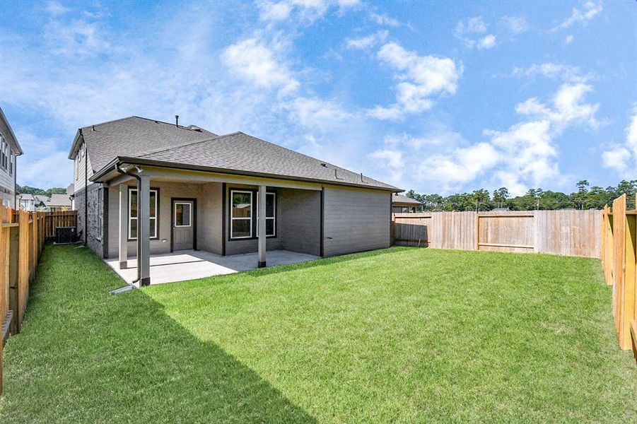 Backyard retreat, offering an abundance of space for kids to play and explore. The possibilities are endless in this outdoor haven, where the joy of open-air activities and family gatherings awaits.