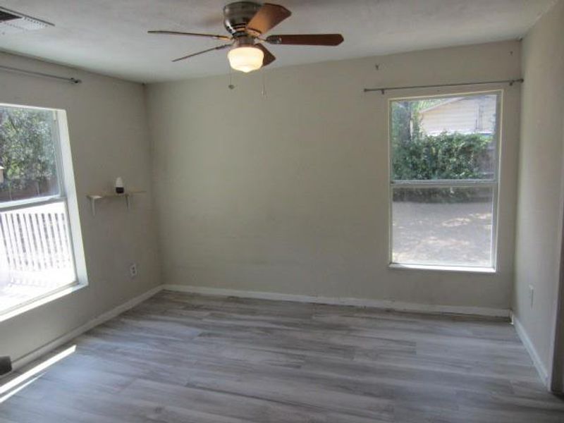 Spacious closet featuring light hardwood / wood-style flooring