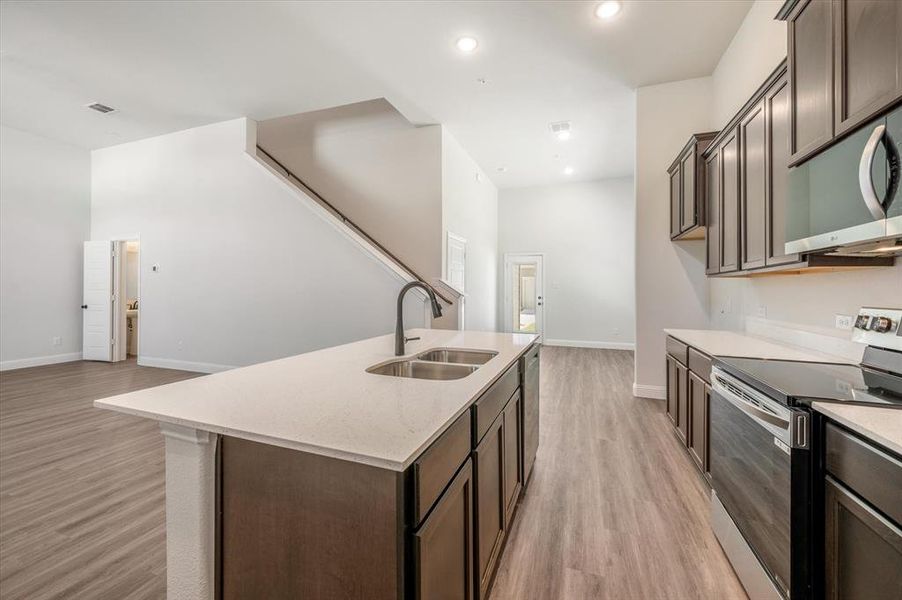 Massive counter-height Island seating, (not shown) Water line to Fridge, Dining in View