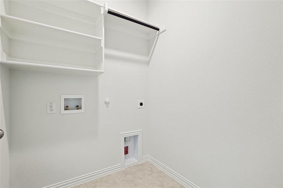 Laundry room featuring tile floors, washer hookup, electric dryer hookup, and hookup for a gas dryer