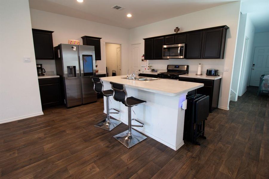 Open floor plan to the living and dining area