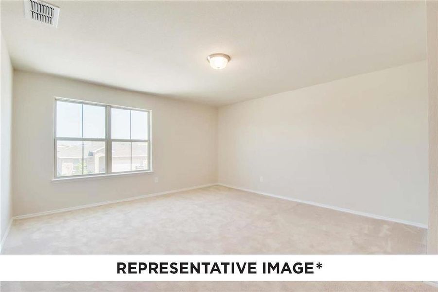 Downstairs secondary bedroom is perfect as a guest room or office retreat from upstairs bedrooms.