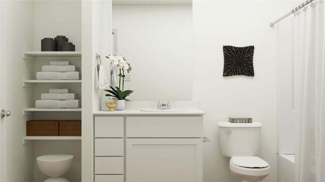 Full bathroom featuring vanity, shower / bath combo with shower curtain, and toilet